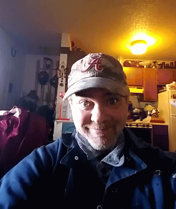 Man Wearing Alabama Hat Smiling