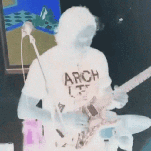 Man Wearing Arch Shirt Playing Guitar