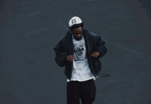 Man Wearing Baby T-Shirt And Black Jacket GIF