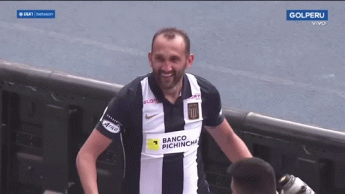 Man Wearing Banco Pichincha Jersey Smiles GIF