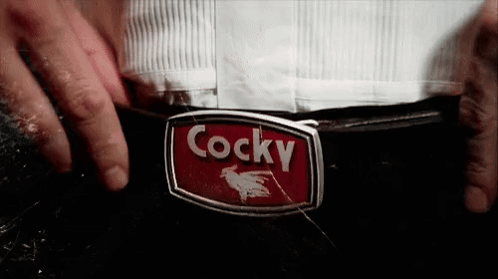 Man Wearing Belt With Cocky Buckle