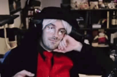 Man Wearing Black Hat and Headphones