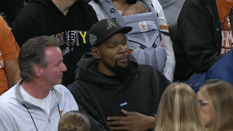 Man Wearing Black Hoodie Doing Hook Em Sign GIF