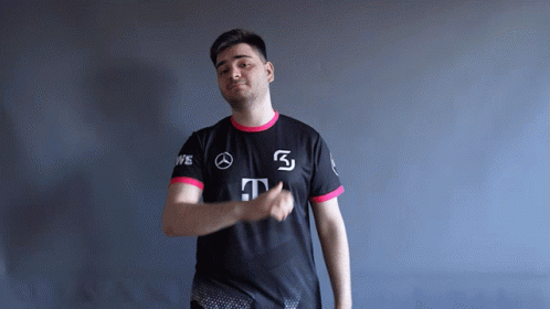 Man Wearing Black Shirt With Mercedes Logo