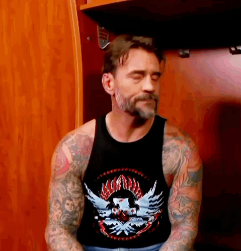 Man Wearing Black Tank Top With Eagle