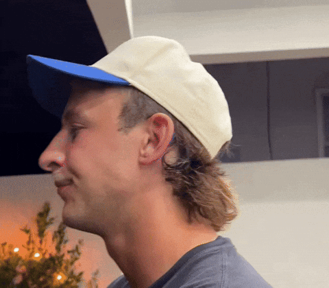 Man Wearing Blue Brim Hat