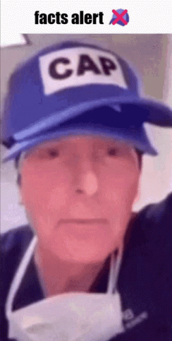 Man Wearing Blue Cap