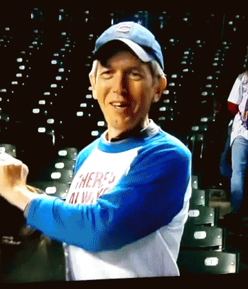 Man Wearing Blue Hat and White Shirt