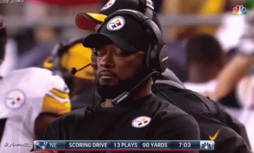 Man Wearing Bose Headphones Watches NBC Football