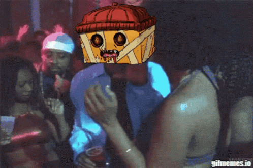 Man Wearing Box on Head Dancing in Club