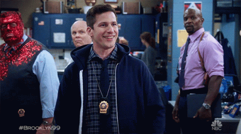 Man Wearing Brooklyn 99 Badge