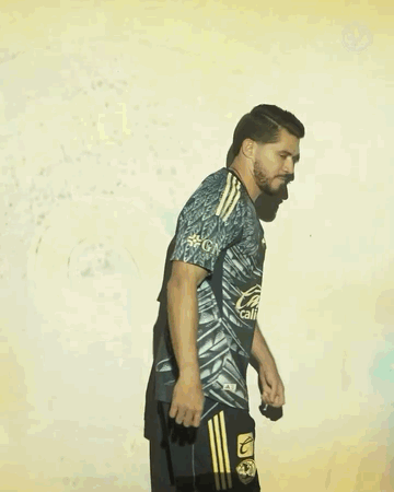 Man Wearing Caliente Shirt