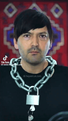 Man Wearing Chain With Padlock