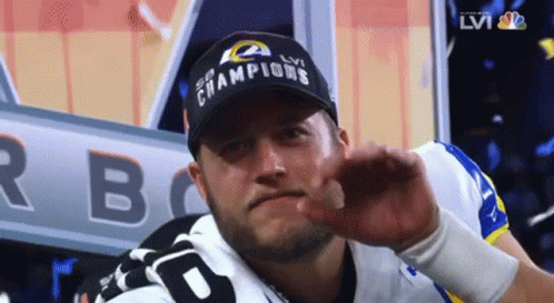 Man Wearing Champions Hat