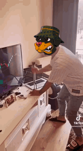 Man Wearing Dog Mask Standing in Front of Television