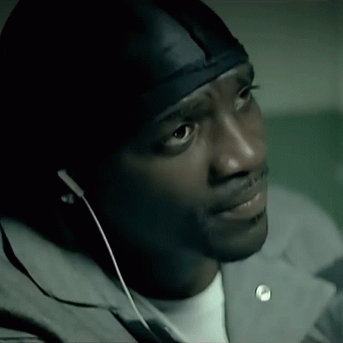 Man Wearing Ear Buds And Headband GIF