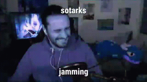 Man Wearing Earbuds Listening To Sotarks Jamming GIF