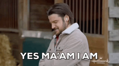 Man Wearing Earbuds Saying Yes Ma'am GIF