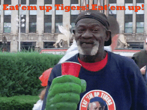 Man Wearing Eat Em Up Tigers Shirt