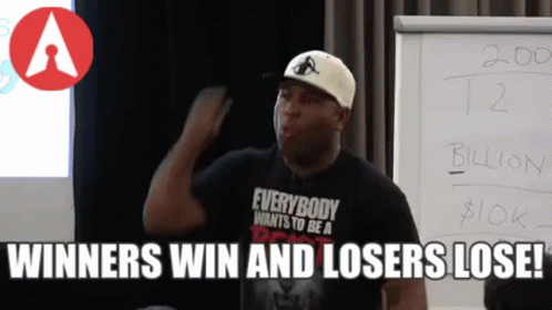 Man Wearing Everybody Wants To Be A Winner Shirt
