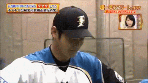 Man Wearing F Baseball Cap