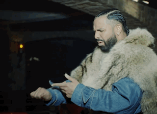 Man Wearing Fur Coat, Denim Jacket Checking Watch