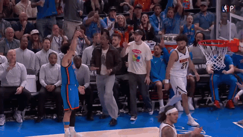 Man Wearing Gatorade T-Shirt Watching Basketball