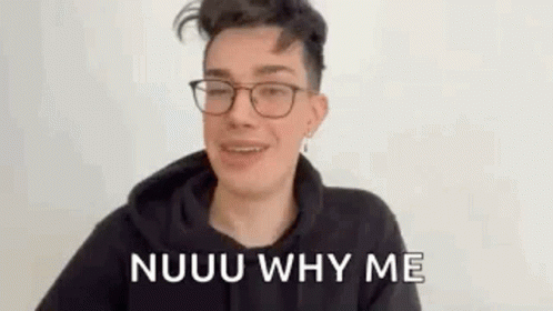 Man Wearing Glasses and Black Hoodie Making Nuuu Face