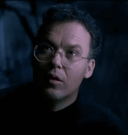 Man Wearing Glasses and Black Shirt Close Up
