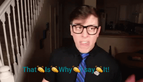 Man Wearing Glasses and Blue Tie Saying That