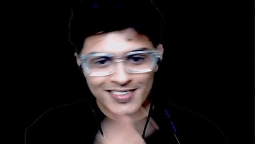Man Wearing Glasses And Earbuds Giving Middle Finger GIF