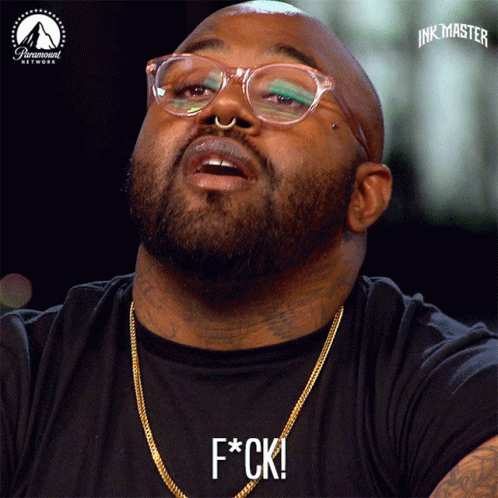 Man Wearing Glasses and F*ck Shirt