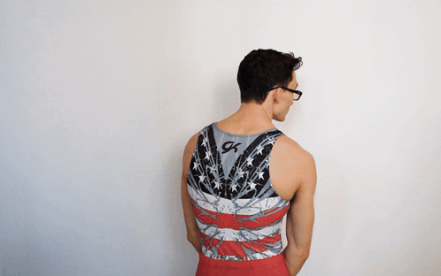 Man Wearing Glasses and G Tank Top