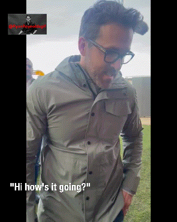 Man Wearing Glasses And Gray Shirt Saying Hi GIF