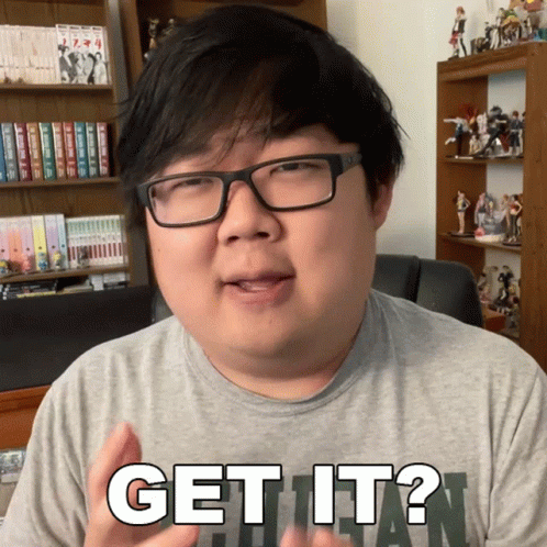 Man Wearing Glasses and Gray Shirt Says Get It