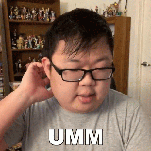 Man Wearing Glasses And Grey Shirt With Umm GIF