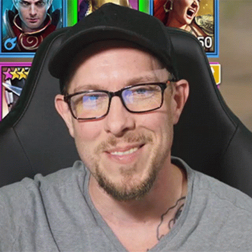Man Wearing Glasses And Hat In Front Of Screen 50 GIF
