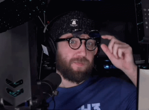Man Wearing Glasses and Hat Number 43