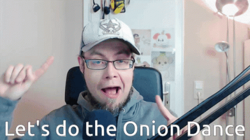 Man Wearing Glasses and Hat Saying Onion Dance