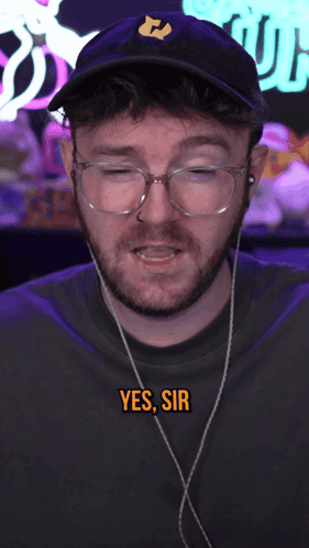 Man Wearing Glasses and Hat Saying Yes Sir