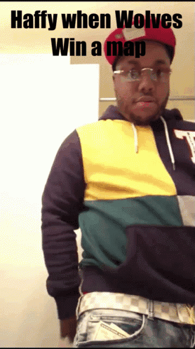 Man Wearing Glasses And Hat Says Haffy GIF