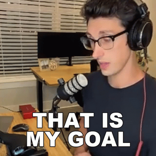Man Wearing Glasses and Headphones Saying Goal