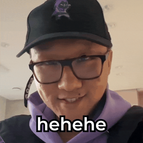 Man Wearing Glasses and Hehene Hat