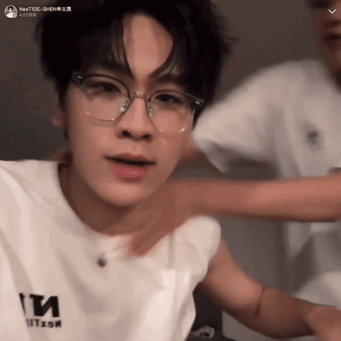 Man Wearing Glasses And Nexttide T-Shirt GIF