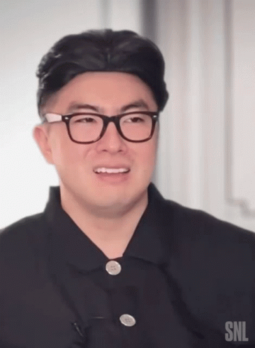 Man Wearing Glasses and SNL Shirt