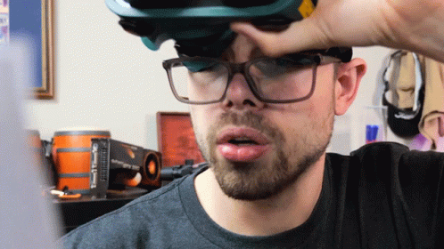 Man Wearing Glasses and VR Headset