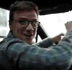 Man Wearing Glasses Driving Car