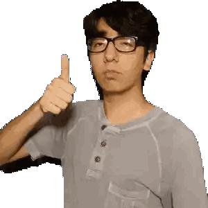 Man Wearing Glasses Giving Thumbs Up