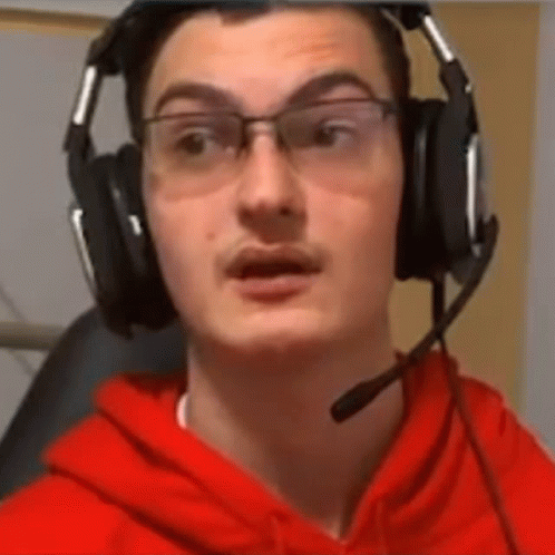 Man Wearing Glasses Headphones and Microphone