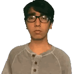 Man Wearing Glasses Holding Green Object